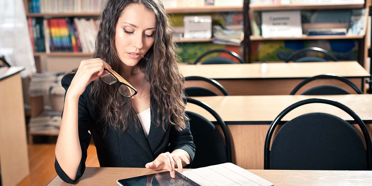 Student sitting at the desk 